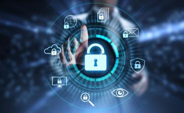 A hand points at a blue padlock icon with security icons surrounding it in a circle